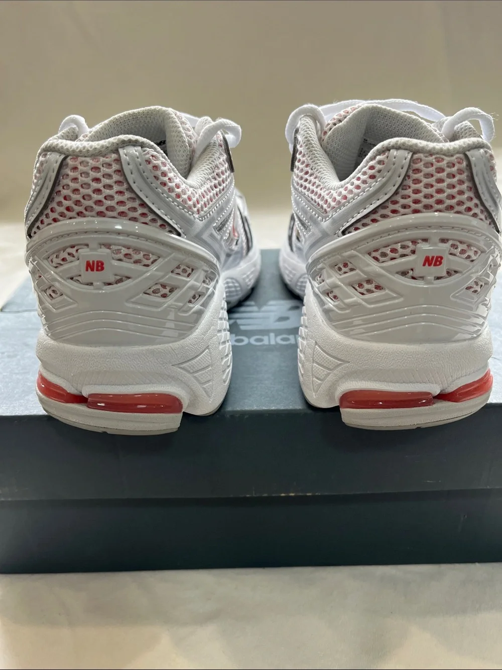 New Balance White and Light Pink Mesh Sneakers